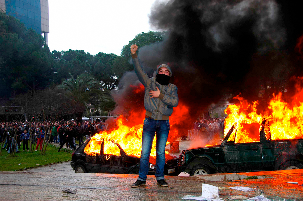 Communist_fist_on_demonstrations_of_21_January_2011_NOCAPTIONS.jpg