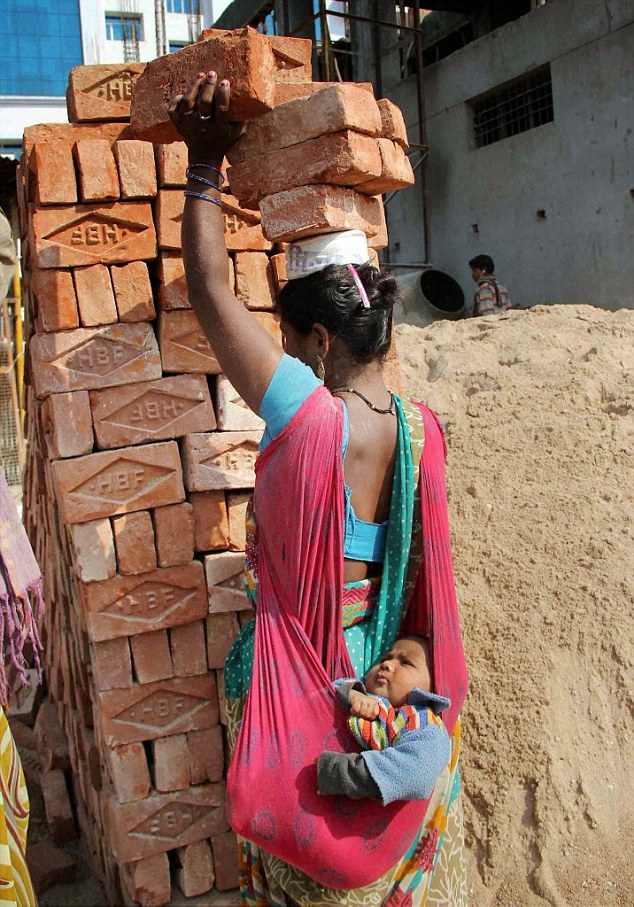 3e18895300000578-0-a-hardworking-mother-carries-carrying-six-bricks-on-your-head-is-a-2-1489044385041-1489076509-3765605_1531212239-1931481.jpg