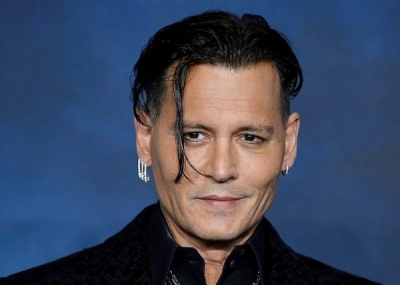 Johnny Depp del për herë të parë publikisht në premierën e filmit më të ri